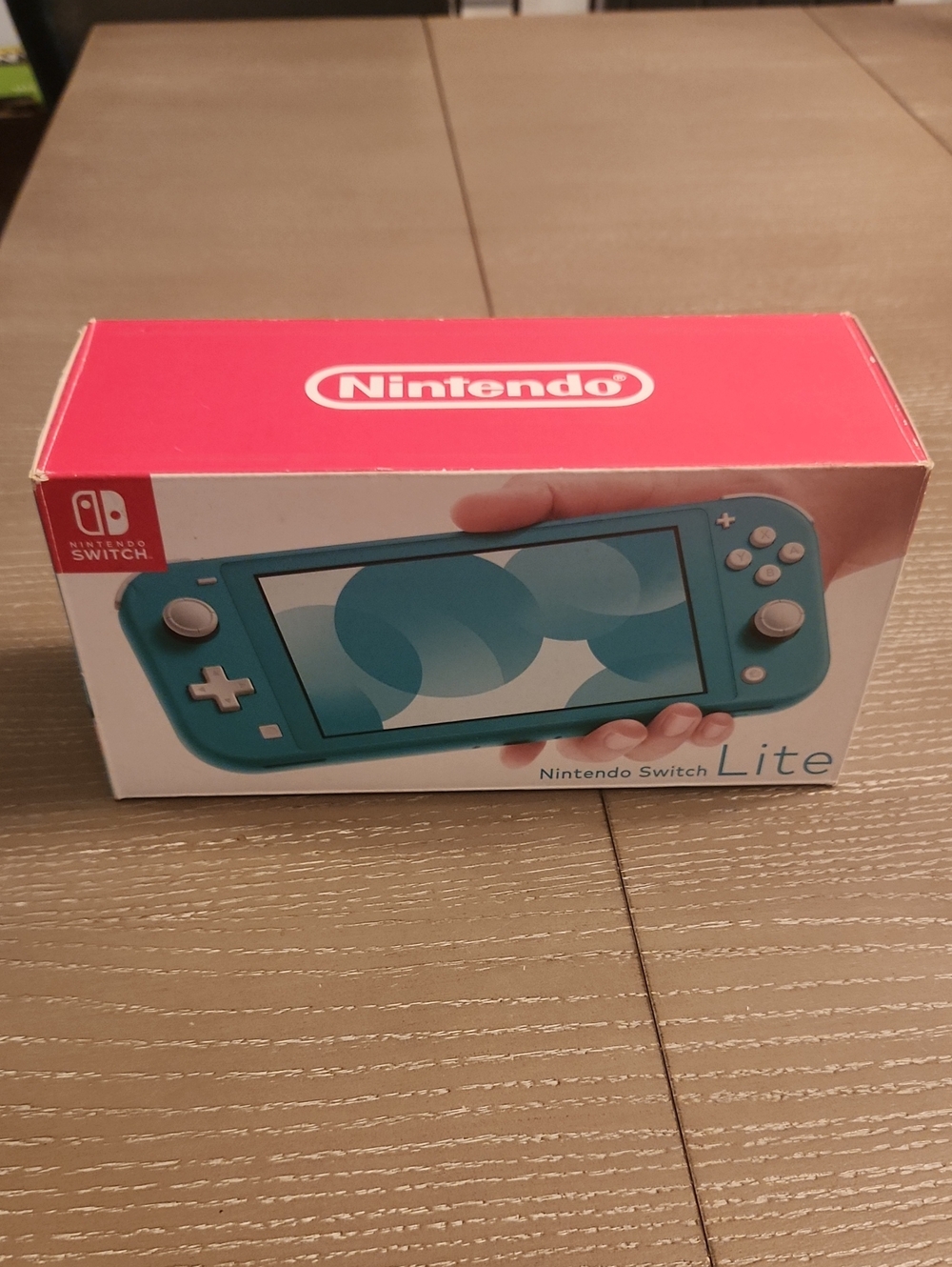 Nintendo Switch Lite Teal Handheld Console  Nintendo + 2 Games + NewTravel Case